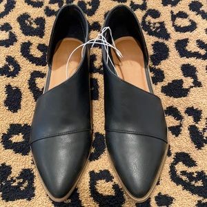 Universal Thread asymmetrical style shoes.